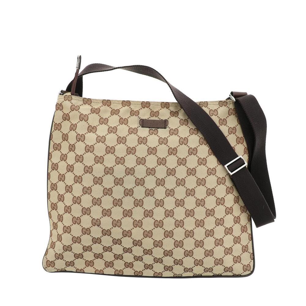 Gucci GG Canvas messenger bag iconic monogram pattern brown
